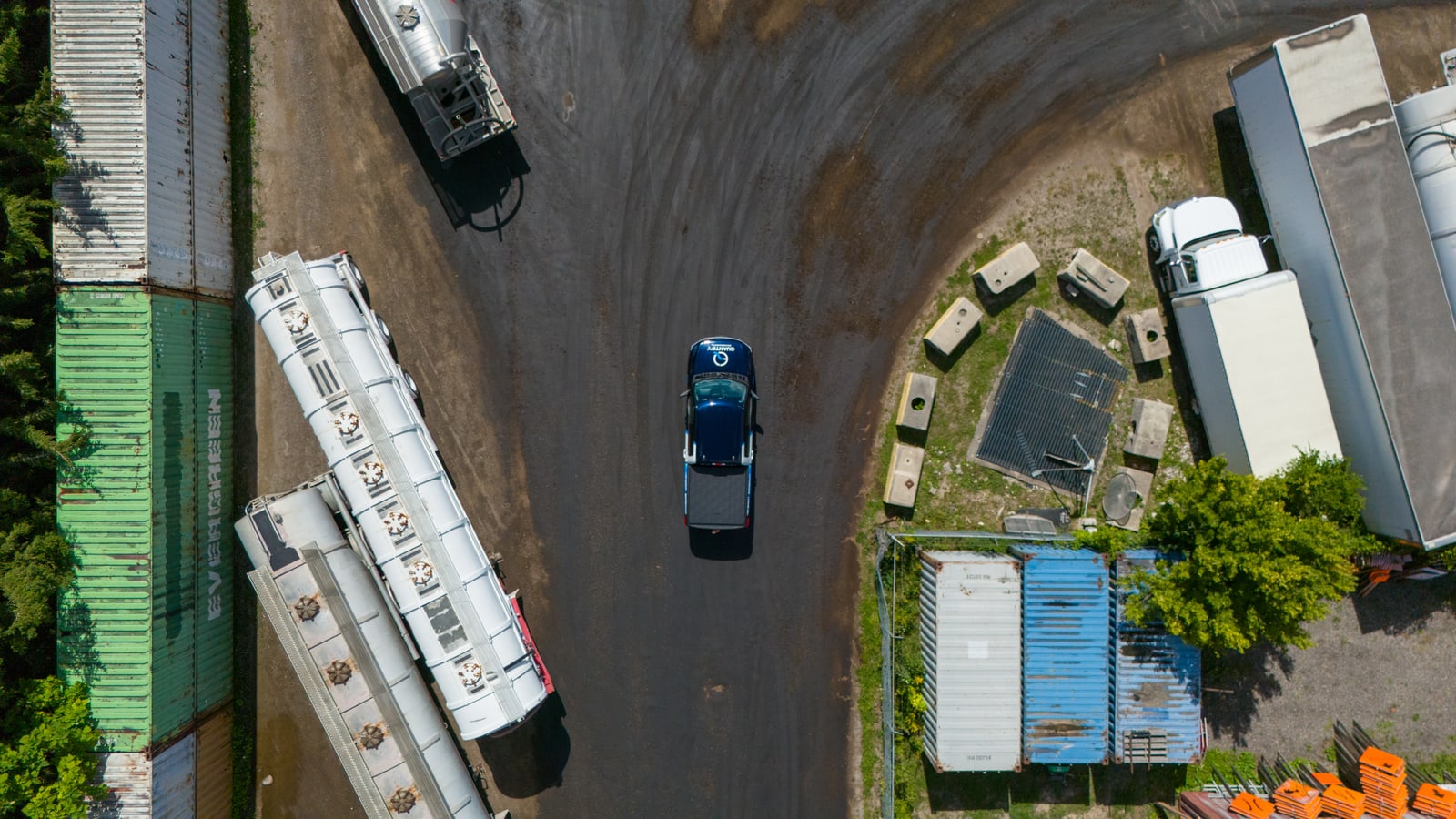 The Quantify truck seen from directly above, on the gravel apron of a bulk terminal